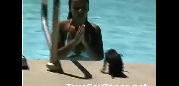  Amateur guy films his girlfriend with big tits in wet bikini